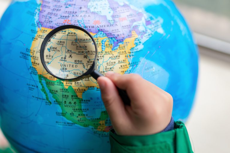 Zhongshan,china February 7, 2018:kid Looking At The Map Of The U