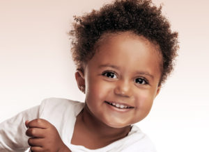 Closeup Portrait Of A Cute Little African American Boy Isolated