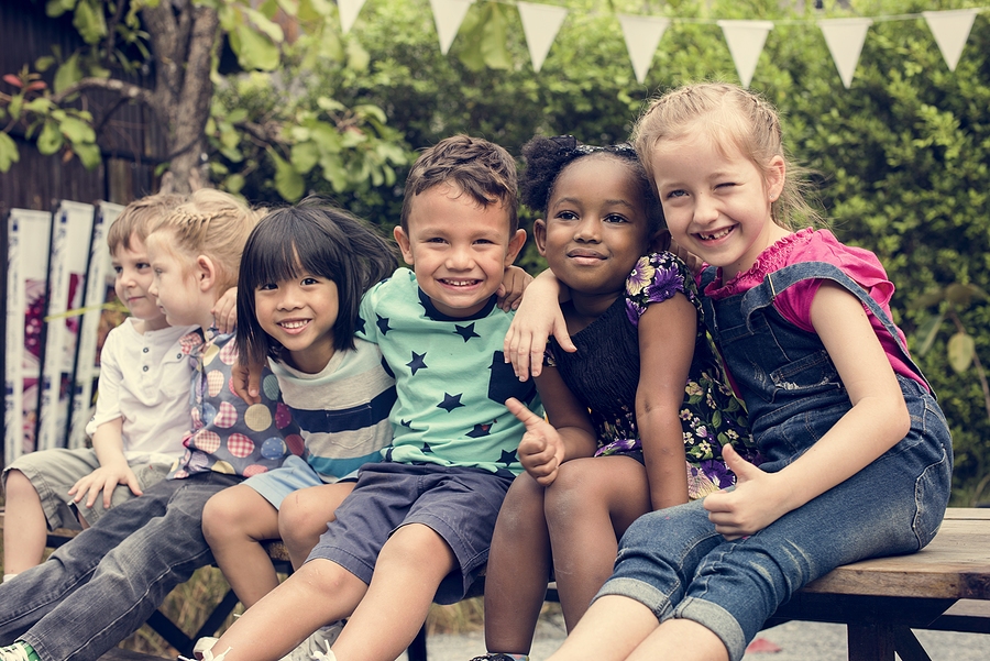 Group Of Diverse Kids Sitting Together